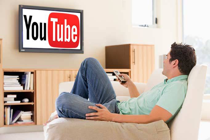 man-on-sofa-watching-youtubejpg