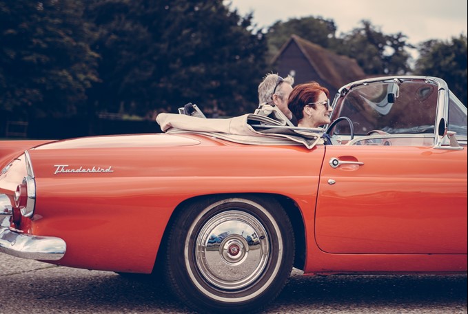 Couple in a convertible